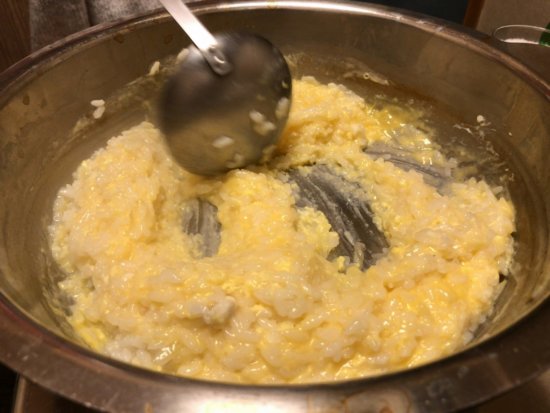大阪ふぐや さでん_煮立ったお米に溶き卵を投入